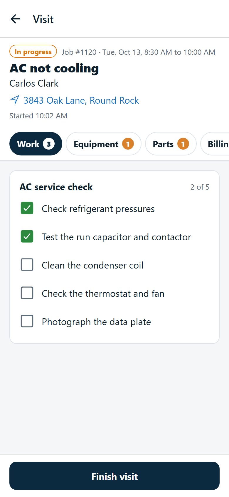 A technician’s visit on a phone: the job, the customer, a checklist with two items ticked, and Finish visit fixed at the bottom of the screen.