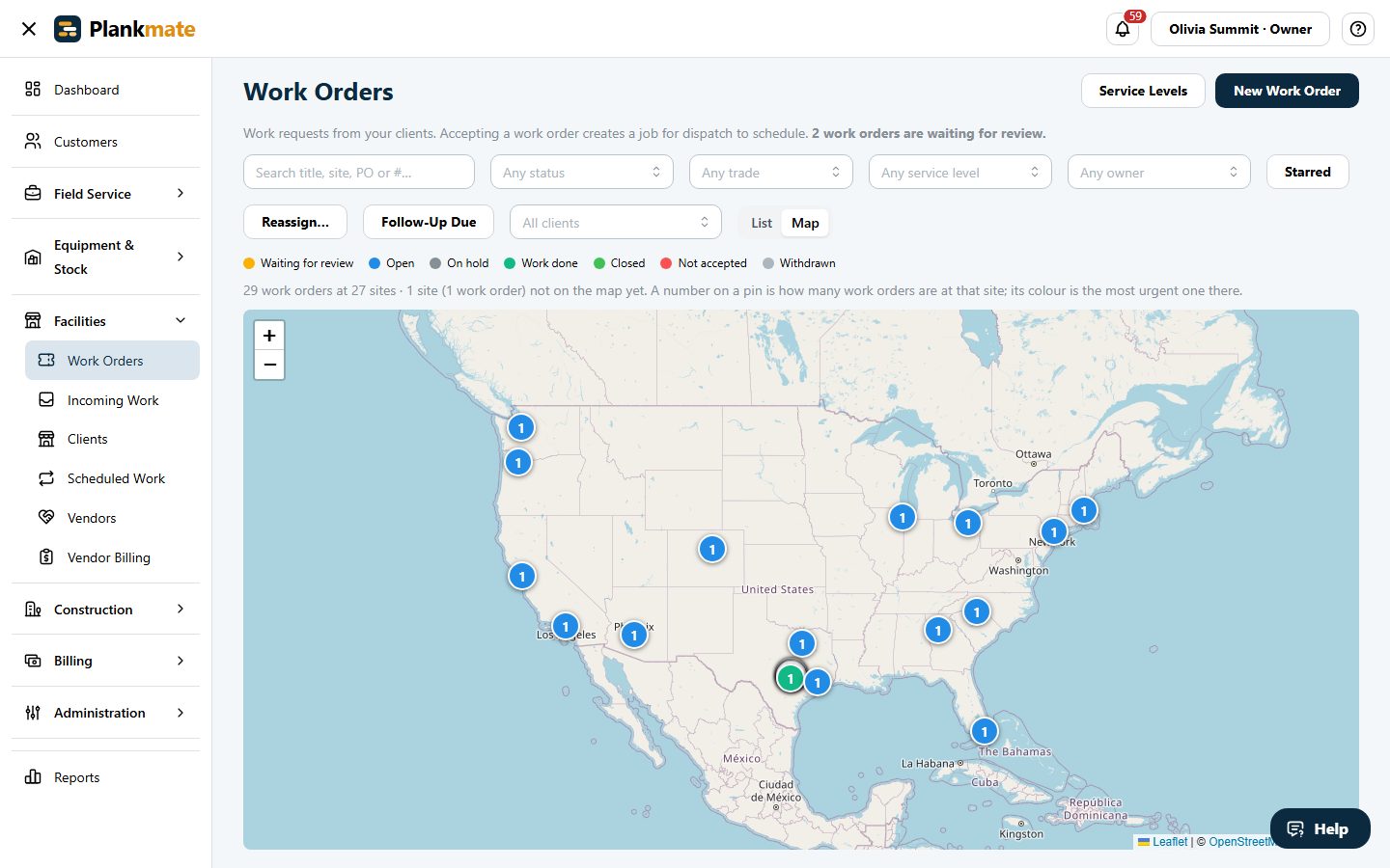 The work order map: one numbered pin for each site across the country, coloured by status, with the filters above it.